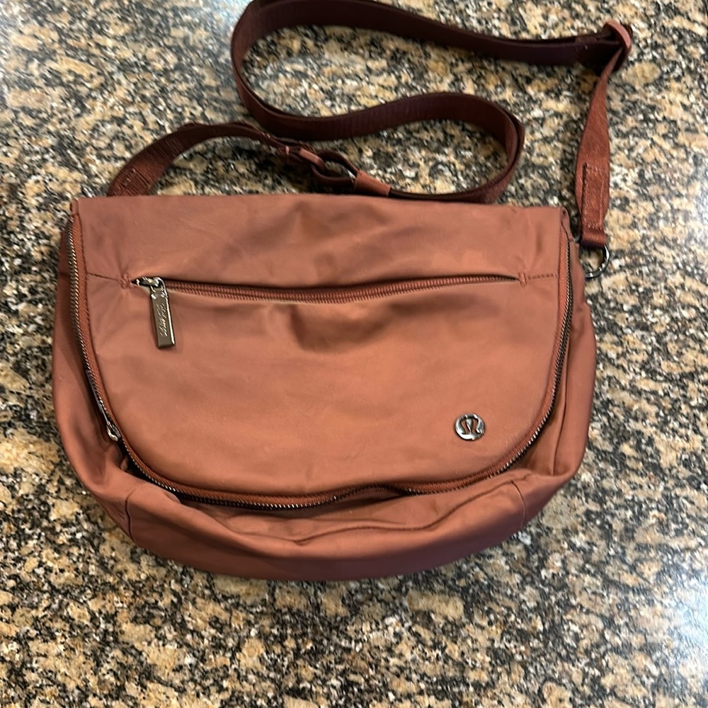 Lululemon All Night Festival Bag 5L Roman Red. Slight discoloration from zipper.